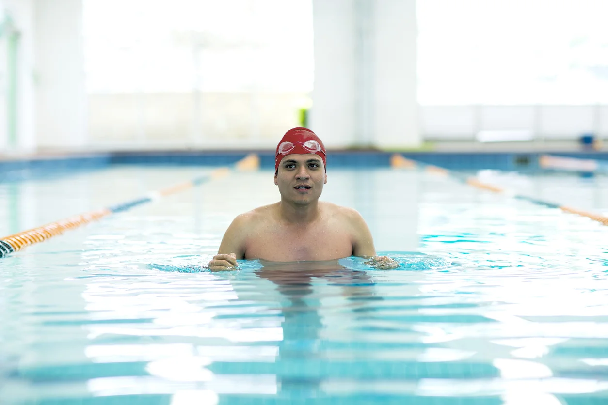 Young athletic man with butterfly swimming technique Young athletic man with butterfly swimming technique